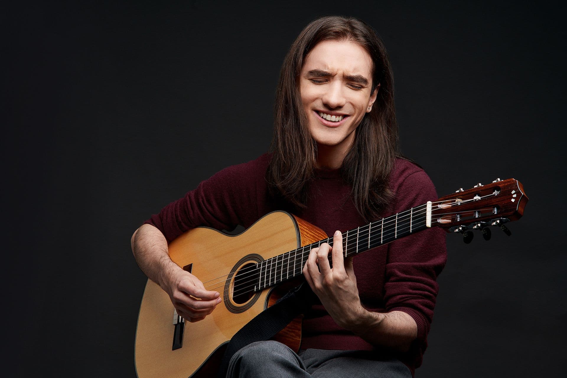 Sam playing guitar